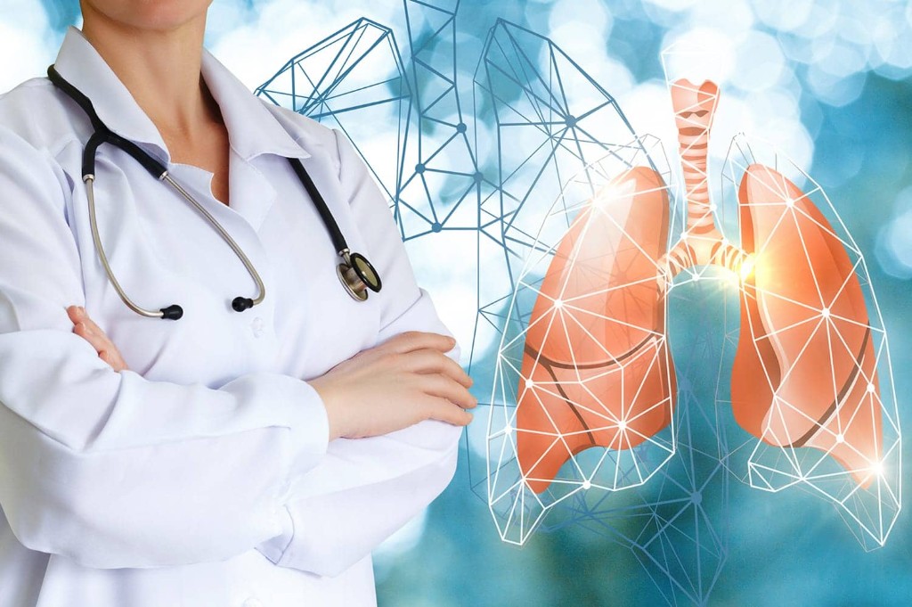 Physician in a lab coat beside a stylised lung graphic with a digital mesh overlay