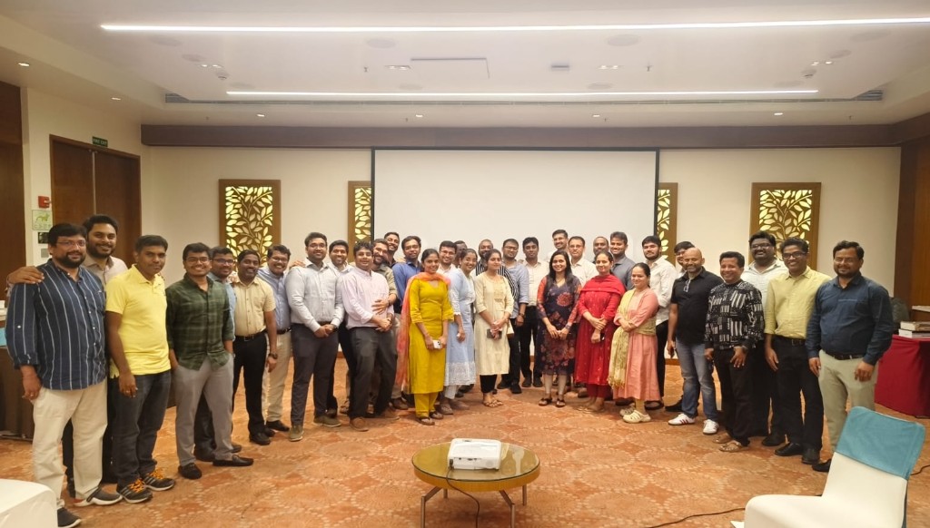 Large group photograph after a financial and wealth-management session