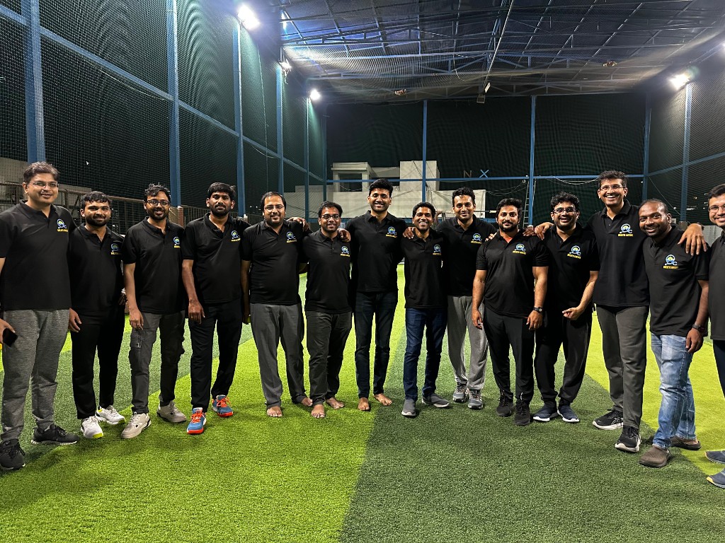 NAPA members standing together in a line on the indoor cricket turf
