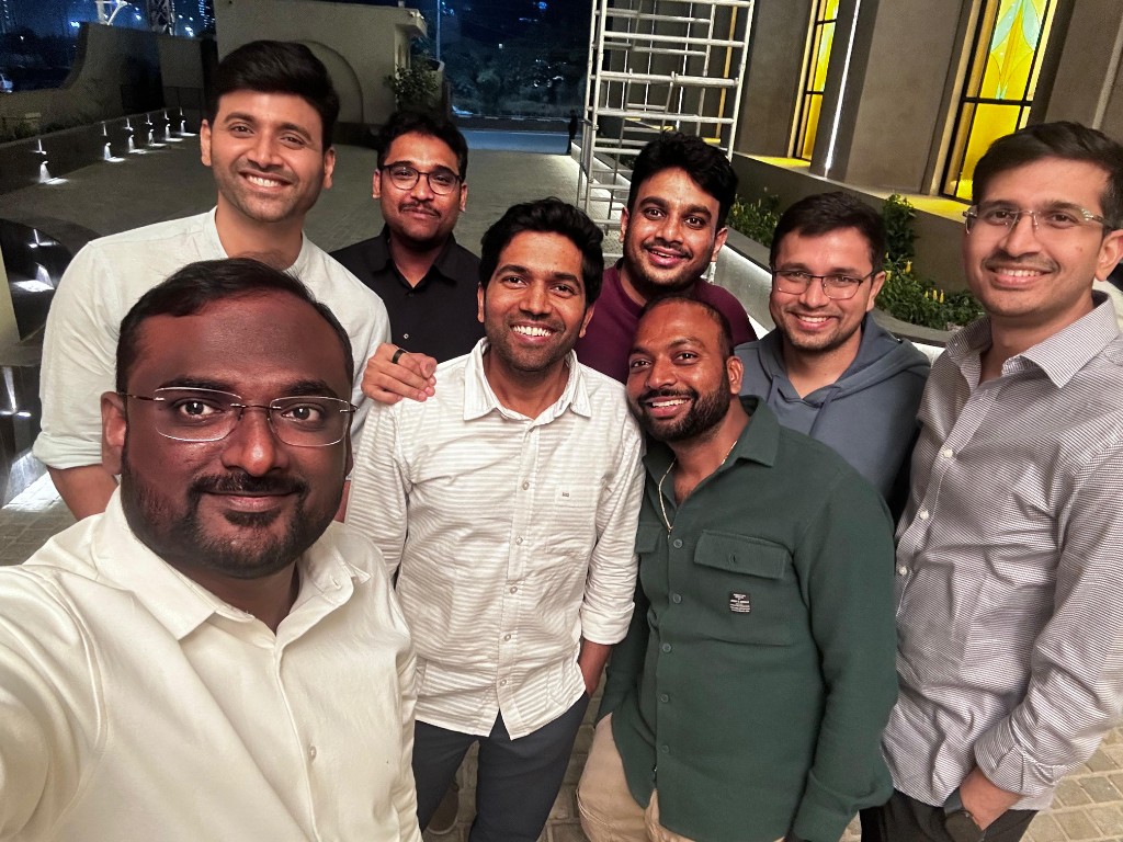 Outdoor evening group photo during a networking dinner