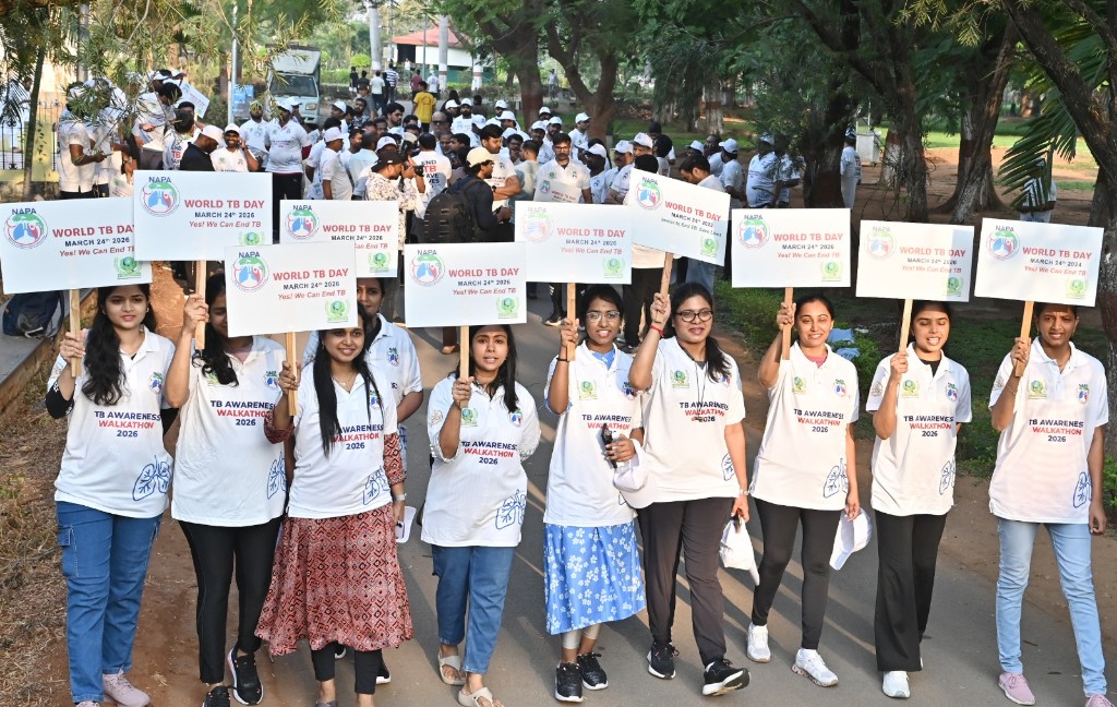 Front row of walkers carrying World TB Day placards